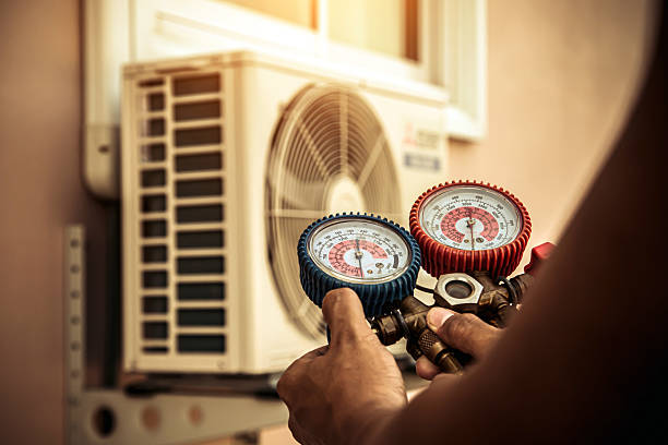 Professional Air Conditioning Service technician working in Florence, CO